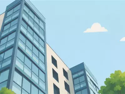 Edificios modernos de oficinas de cristal contra el cielo